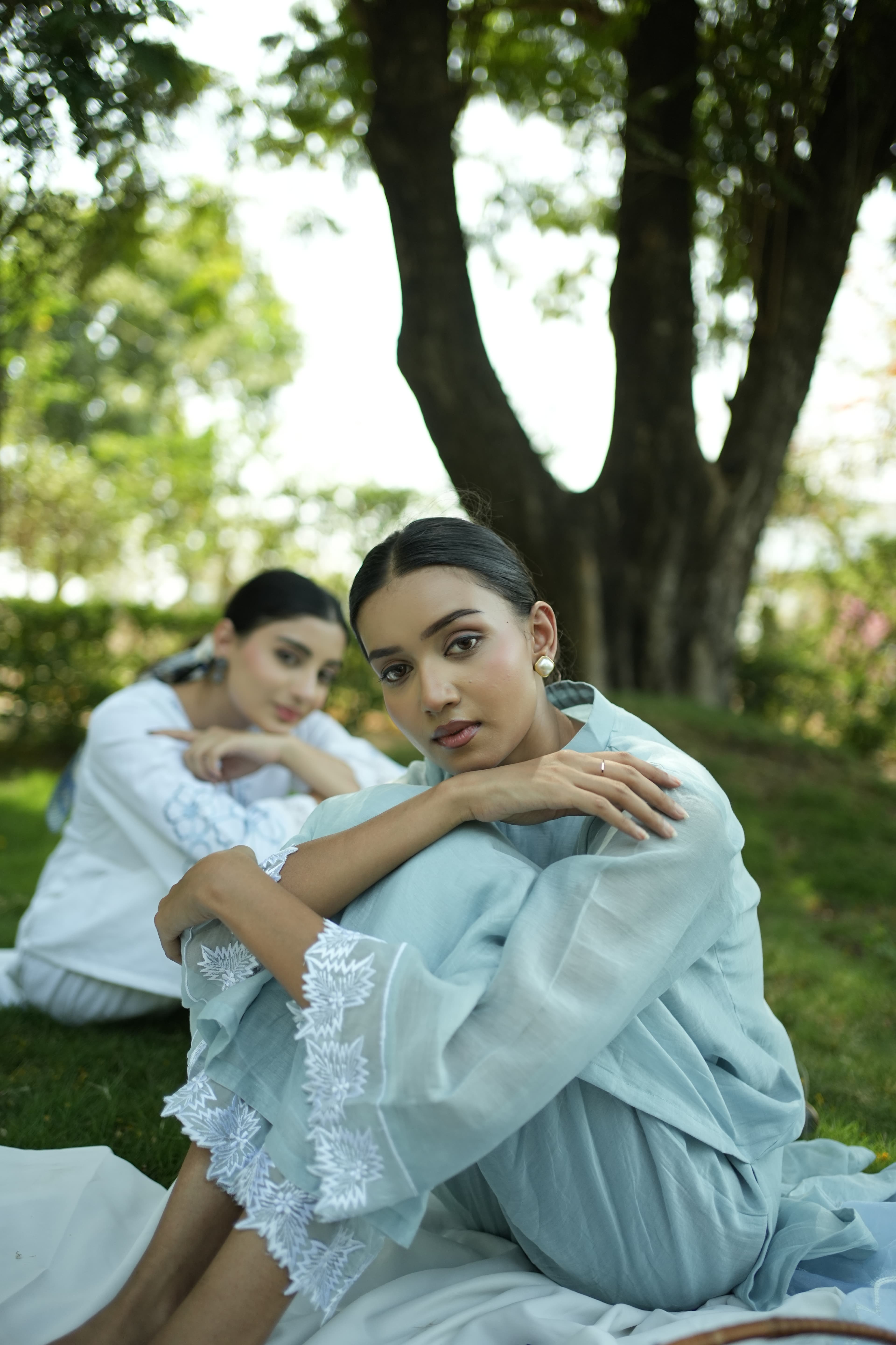 Leaf and Loom editorial lookbook image in a nature-led setting.
